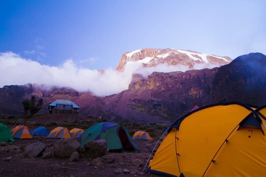 Climbing Kilimanjaro in May: Long rains ease - best time to climb Kilimanjaro with Foot Slopes Tours and Safaris